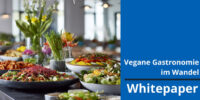 Whitepaper „Vegane Gastronomie im Wandel“ Buffet of colorful vegan dishes on a table, with a blue right-side panel that says 'Vegane Gastronomie im Wandel' and 'Whitepaper'.